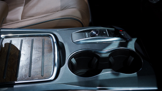 Put real open pore wood in your SUV, stick rubber grips on top of it, nice job Acura.